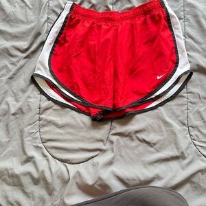 Nike Red Shorts with White and Black Accents
